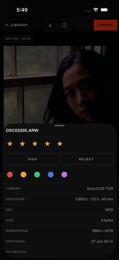 Lumen on iPhone showing a photo's star rating, pick and reject flags, color labels, and full EXIF: camera, exposure, ISO, dimensions, capture date.